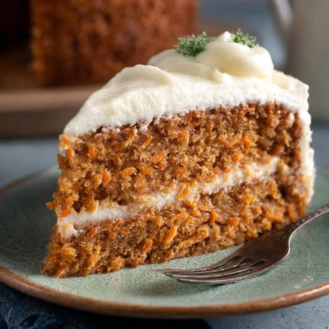 A slice of Amish-style moist carrot cake.